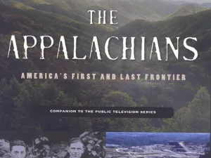 Book cover for The Appalachians: Americas First and Last Frontier showing a color illustration of Appalachian mountains in the background, a vintage black-and-white photograph of two men sitting together in the foreground, and text including details about a public television series and the book editors.