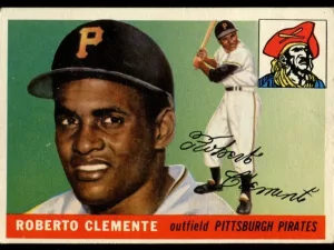 A vintage baseball card featuring Roberto Clemente of the Pittsburgh Pirates. The card displays a portrait of Clemente, a smaller image showing him in a batting stance, a pirate logo, and his autograph near the bottom. The background is green and the nameplate is red.