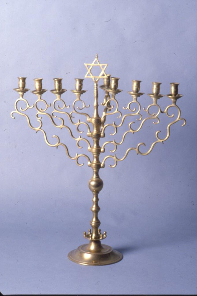 Brass Hanukkah menorah from Machsikei Hadas synagogue.