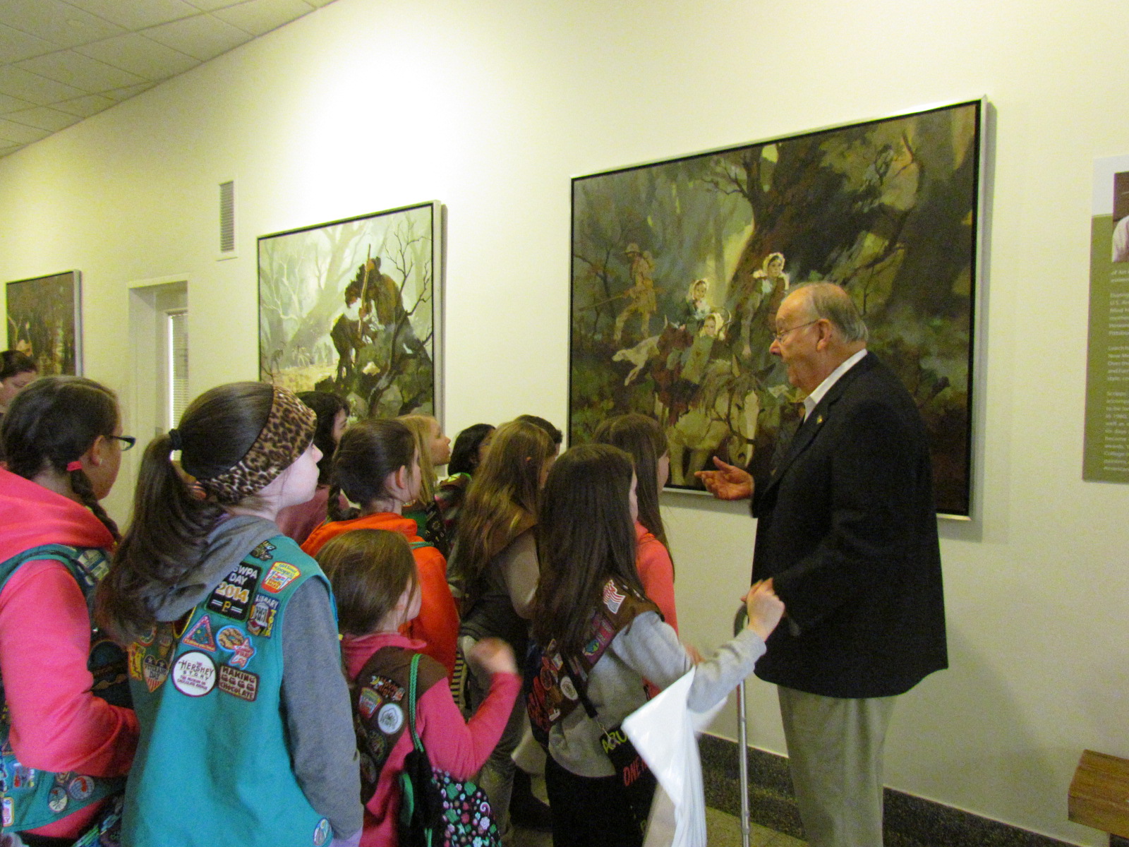 Jack Sheehan, History Center and Fort Pitt Museum docent, with a Girl Scout troop at the Fort Pitt Museum.