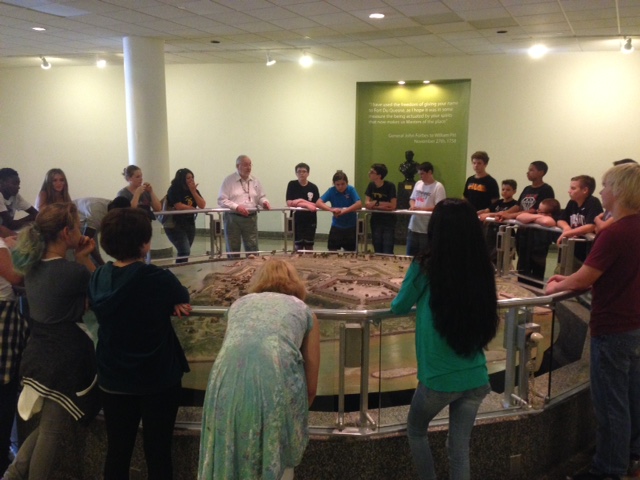 Jack Sheehan, History Center and Fort Pitt Museum docent, showing a school tour the Fort Pitt diorama.