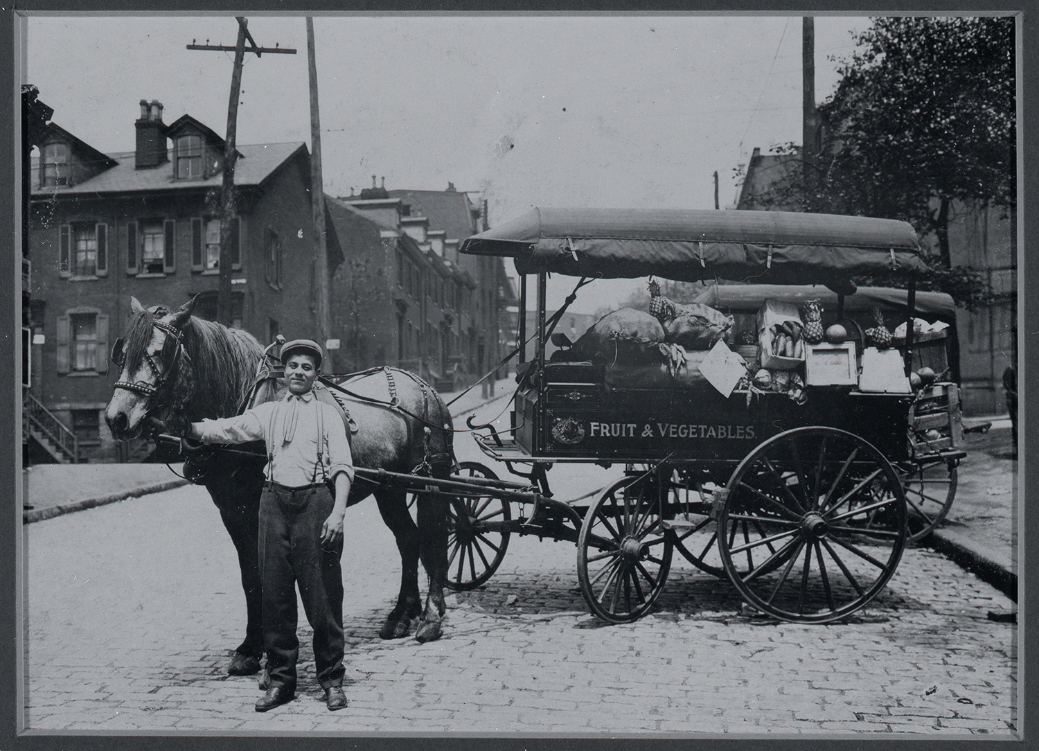 Frank Crisanti and his huckster wagon. Gift of Paul Crisanti. Italian American Collection, Detre Library & Archives at the Heinz History Center.