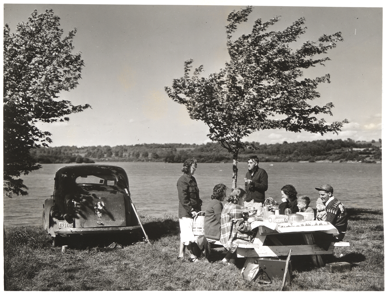 Picnickers enjoy a chilly feast by Pymatuning Reservoir Lake, 1950s. Allegheny Conference on Community Development collection, MSP 285, Detre Library & Archives, Heinz History Center.