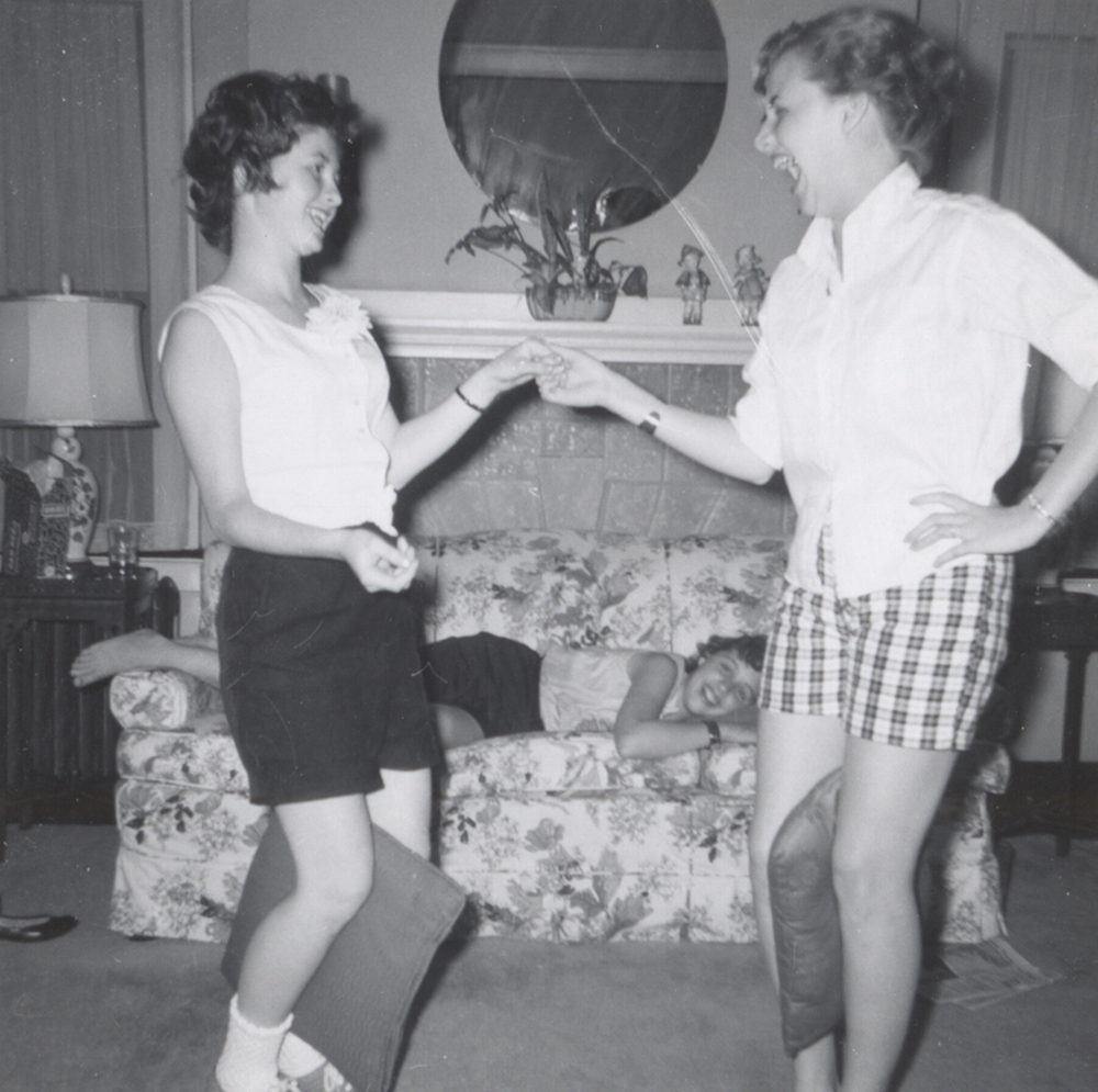 Susie Gordon and Barbara Taylor dance while Diane Taylor watches from the couch, 1958. Taylor Family Collection, Detre Library & Archives at the Heinz History Center.