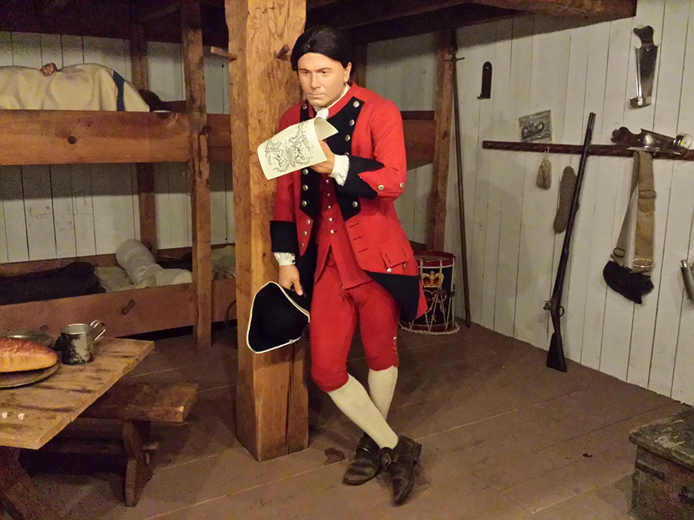 Sergeant “Adam Samm” wearing a sergeant’s uniform of the Royal American Regiment on display at the Fort Pitt Museum.
