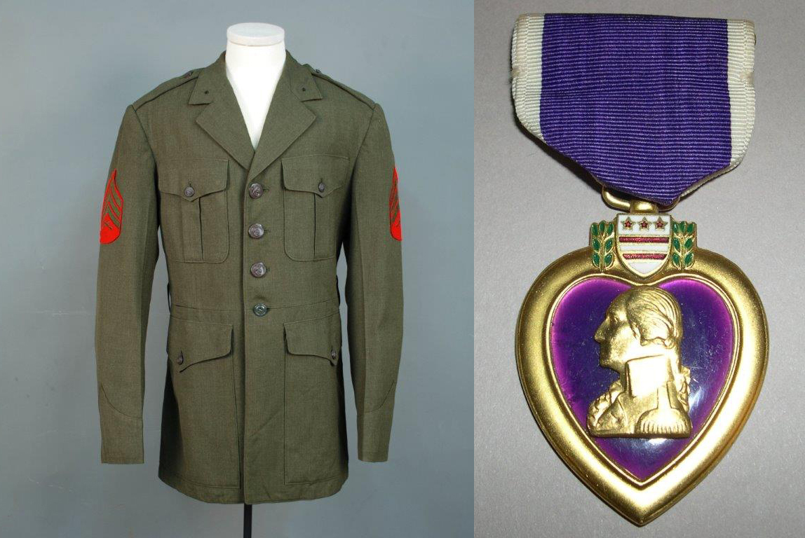 U.S. Marine Purple Heart awarded to John Clark for his service in Vietnam, 1966. U.S. Marine Corps dress jacket, 1960s. Gift of John Clark.