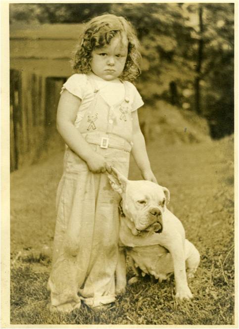 Rae Jean Sprigle poses with her bull dog, c. 1940. Gift of Rae Jean Kurland, MSS 779, Detre Library & Archives at the History Center.