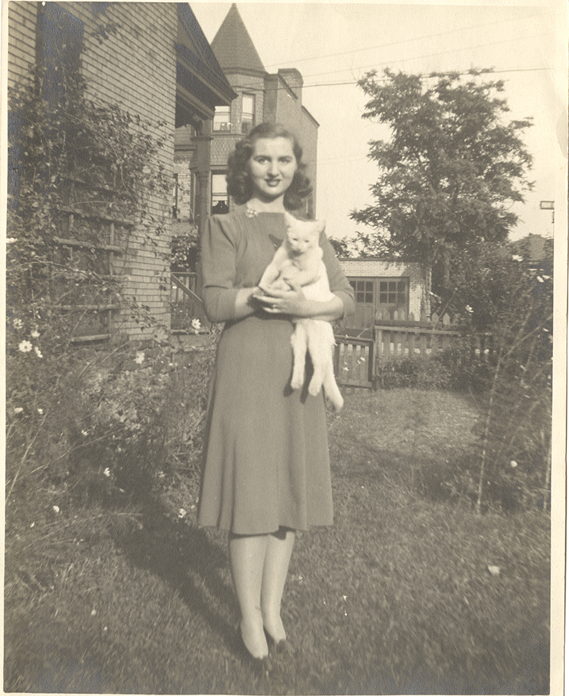 Anna Greenberg poses with her pet cat, c. 1940. Gift from the estate of Anna Greenberg. MSS 1010, Detre Library & Archives at the History Center.