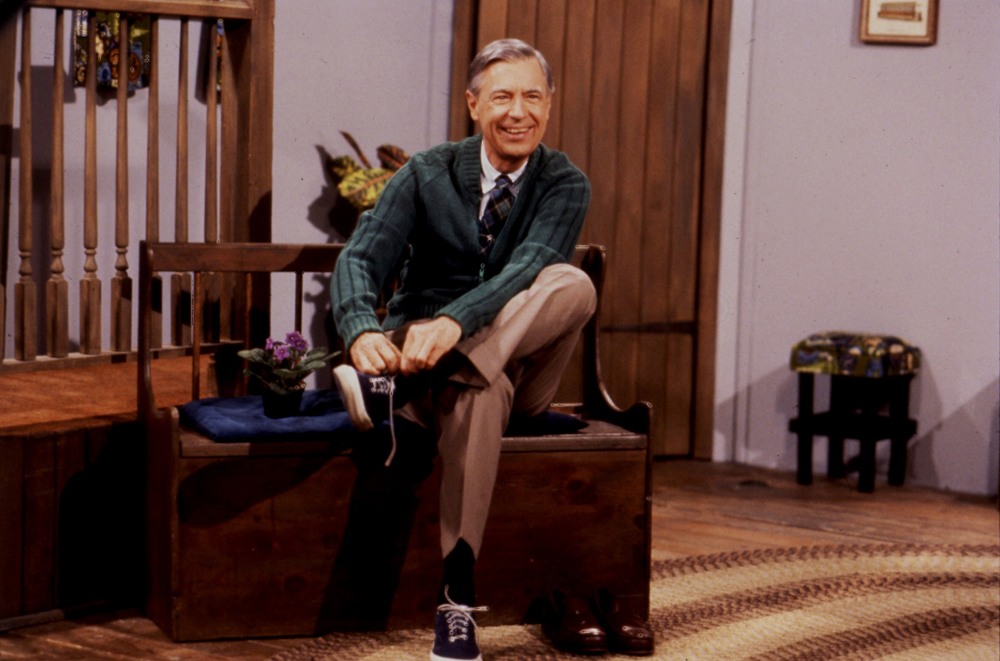 Mister Rogers changing his shoes, which he did at the start of every episode. Photo courtesy of The Fred Rogers Company.