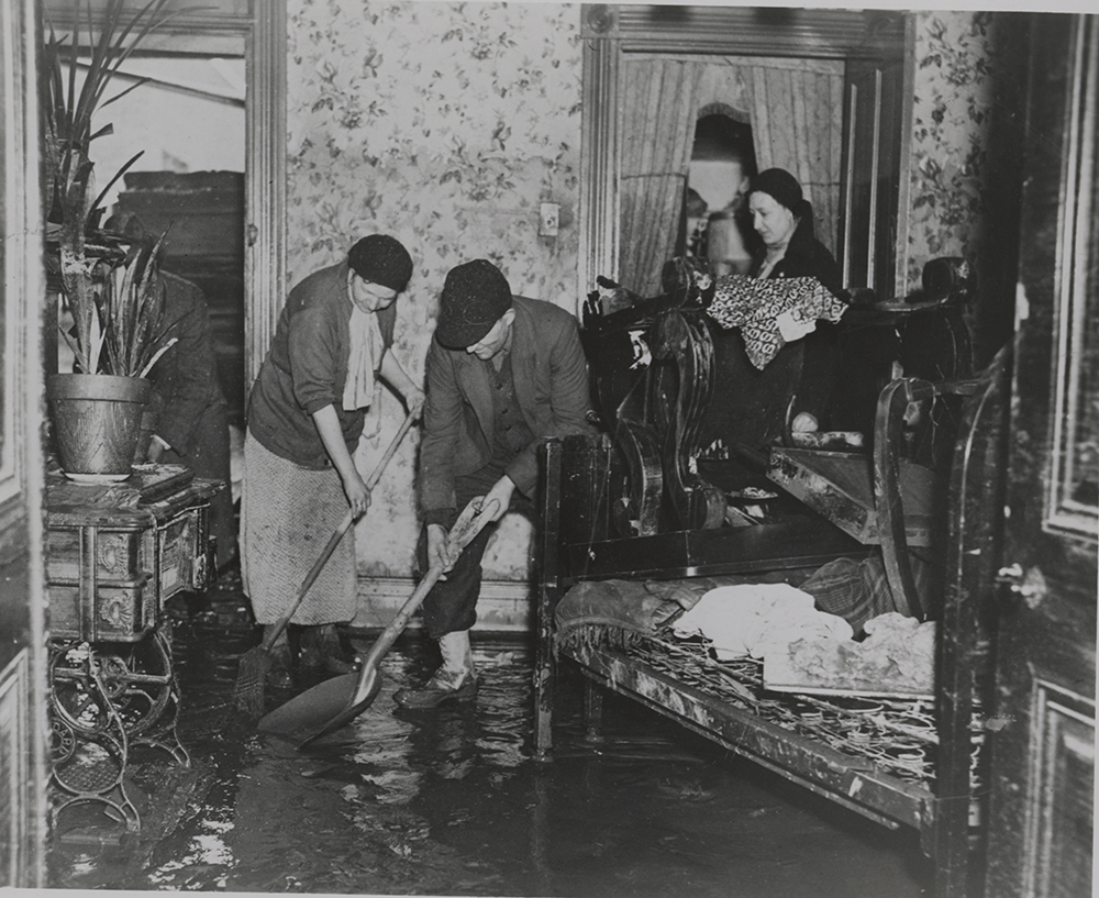 Cleaning up after the flood, 1936. | St. Patrick's Day Flood | Heinz History Center