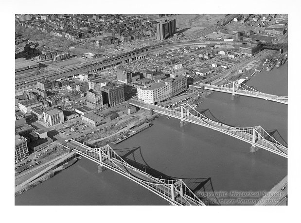 Aerial view of the North Side, featuring Pittsburgh’s “Three Sister” Bridges, the Sixth, Seventh, and Ninth Street Bridges, Allegheny Conference on Community Development Photographs, Detre Library & Archives at the History Center