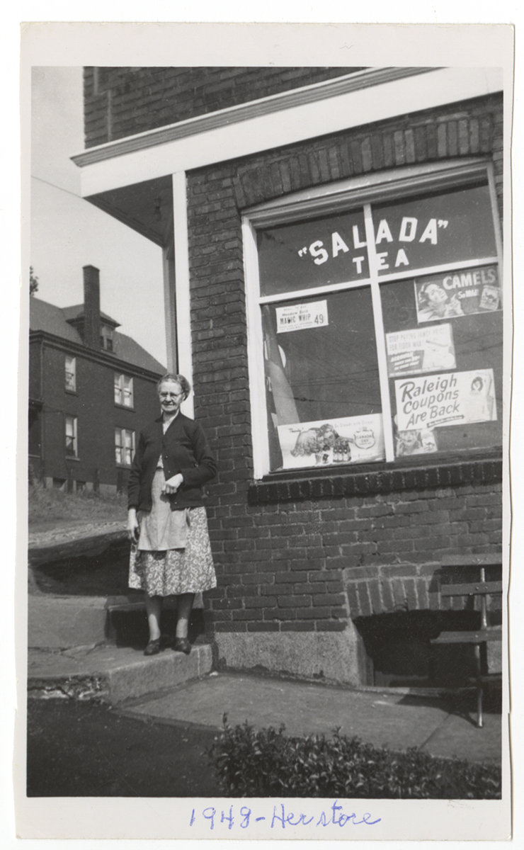 Mary outside her corner store at 22 Overland Street, Duquesne, 1948. From the Rajcan family collection, Detre Library & Archives at the History Center.