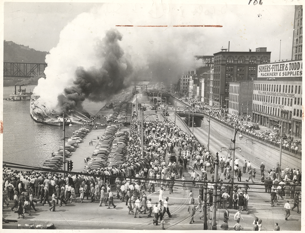 The explosion of the Island Queen brought crowds of people to the Monongahela wharf, 1947. | Heinz History Center