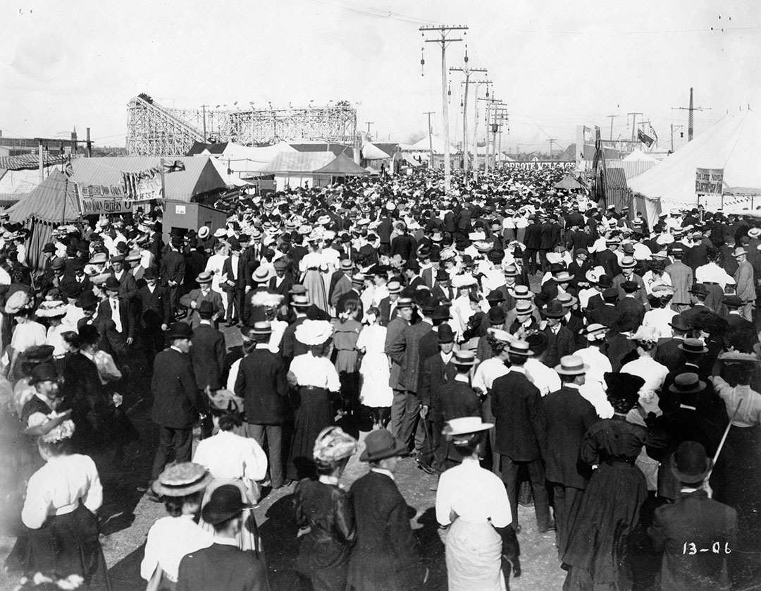 The midway at the Canadian National Exhibition with T. M. Harton’s Scenic Auto-Dip visible in the background, c. 1906. Courtesy of CNE Heritage. | Heinz History Center