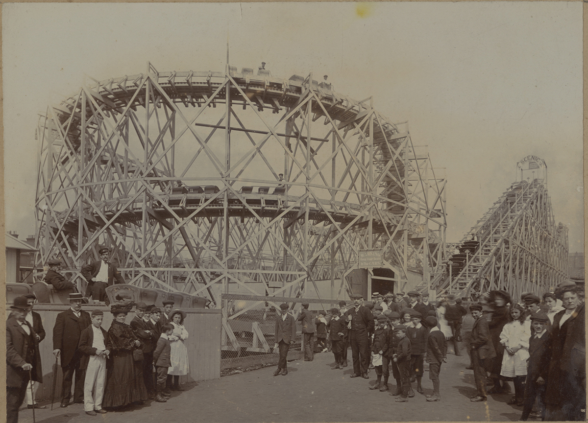 Crowds gather around a new roller coaster built by Erwin Vettel in England in the early 1900s. Crowds gather around a new roller coaster built by Erwin Vettel in England in the early 1900s. | Heinz History Center