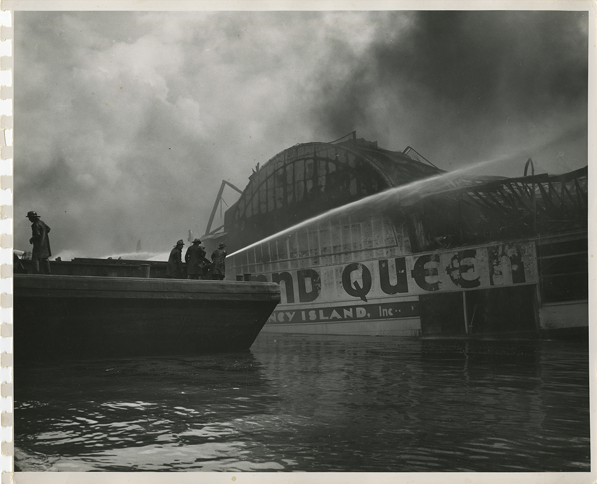 Fireman fight the flames as the Island Queen burns, 1947. | Heinz History Center