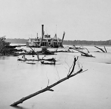 Clearing river snags, c. late 1800s. Credit: U. S. Army Corps of Engineers.