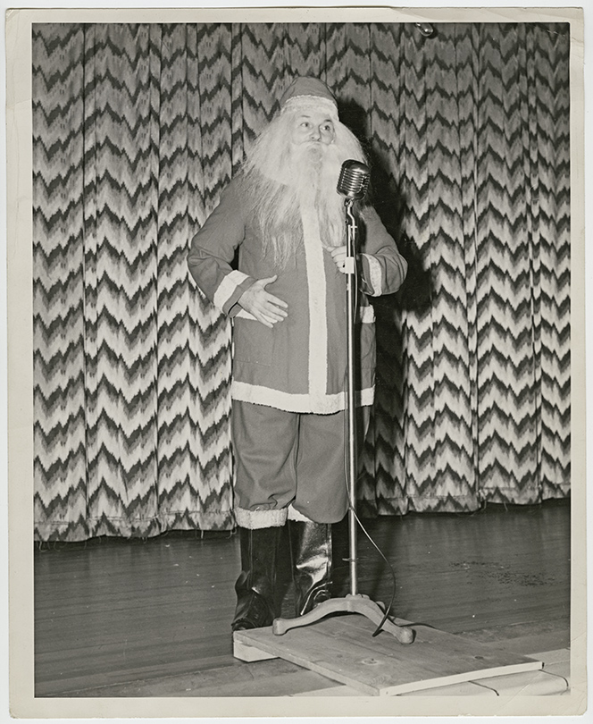 George Heid plays Santa on stage. Photo courtesy of Jim Heid.