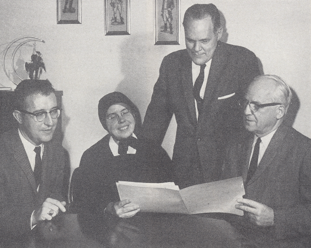 Evanson (on the right) confers with local educators while planning a high school choral performance for a meeting of the National Federation of Music Clubs. Jacob A. Evanson Papers, Detre Library & Archives at the Heinz History Center.