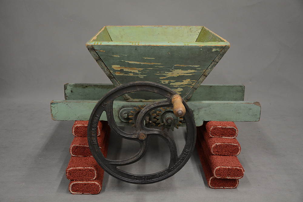 Fruit crusher. It is essential to break the skin of the grapes before pressing the fruit. Gift of Mark Giovannitti, History Center Collections, 2018.24