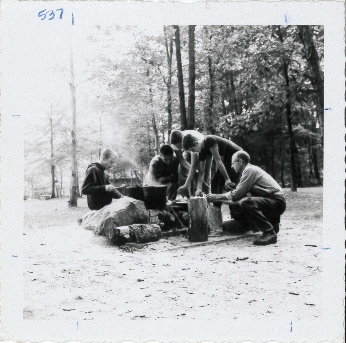 Boy Scout Troop 71 cooking at the camping spot on the Village Green.