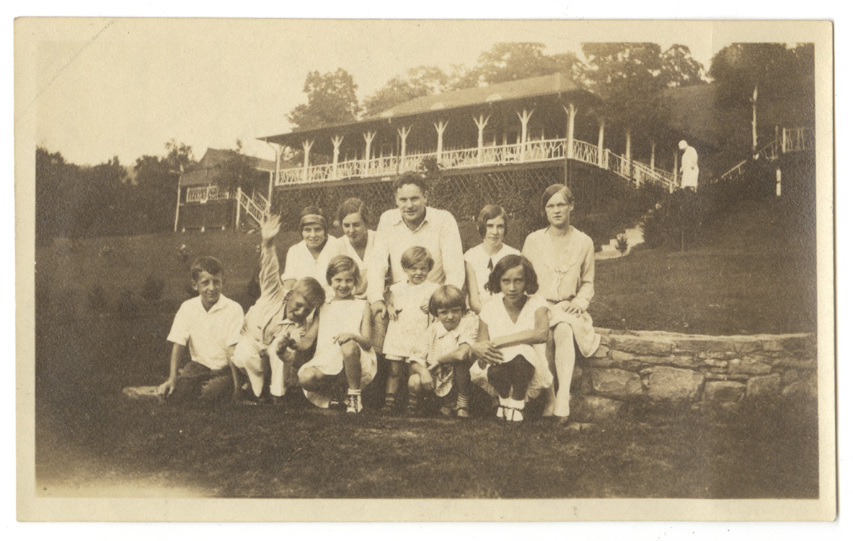 A group poses for a portrait in the center of Camp Horne, 1927. The large dining pavilion and attached kitchen provide the backdrop. Horne’s and Camp Horne Miscellaneous Materials, 1996.0288, Detre Library & Archives at the History Center.