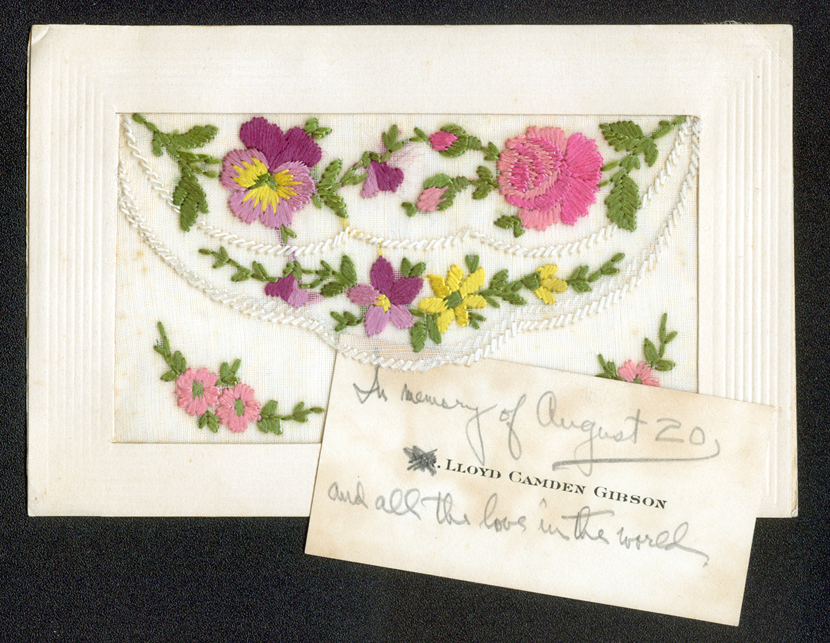 Postcard from France with delicate embroidery on the front envelope.