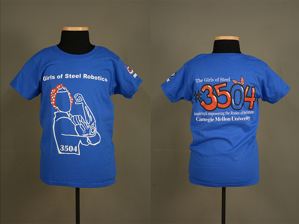 Girls of Steel team T-shirt in the collection of the Senator John Heinz History Center, 2017. Gift of Theresa C. Richards and the Field Robotics Center.