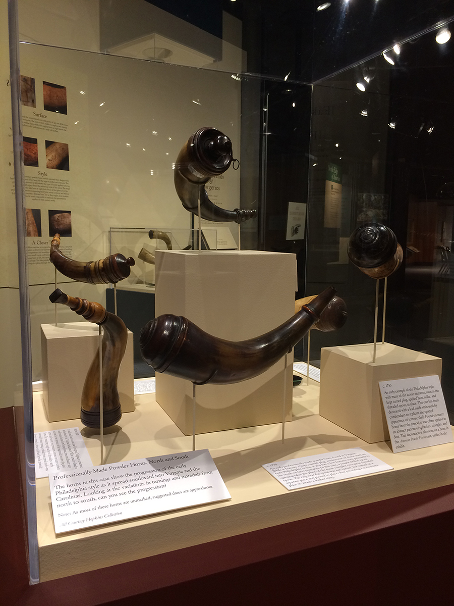 A collection of powder horns made by horners, combmakers, and turners, showing stylistic variations from Pennsylvania, Virginia, and North Carolina. Courtesy Hopkins Collection.