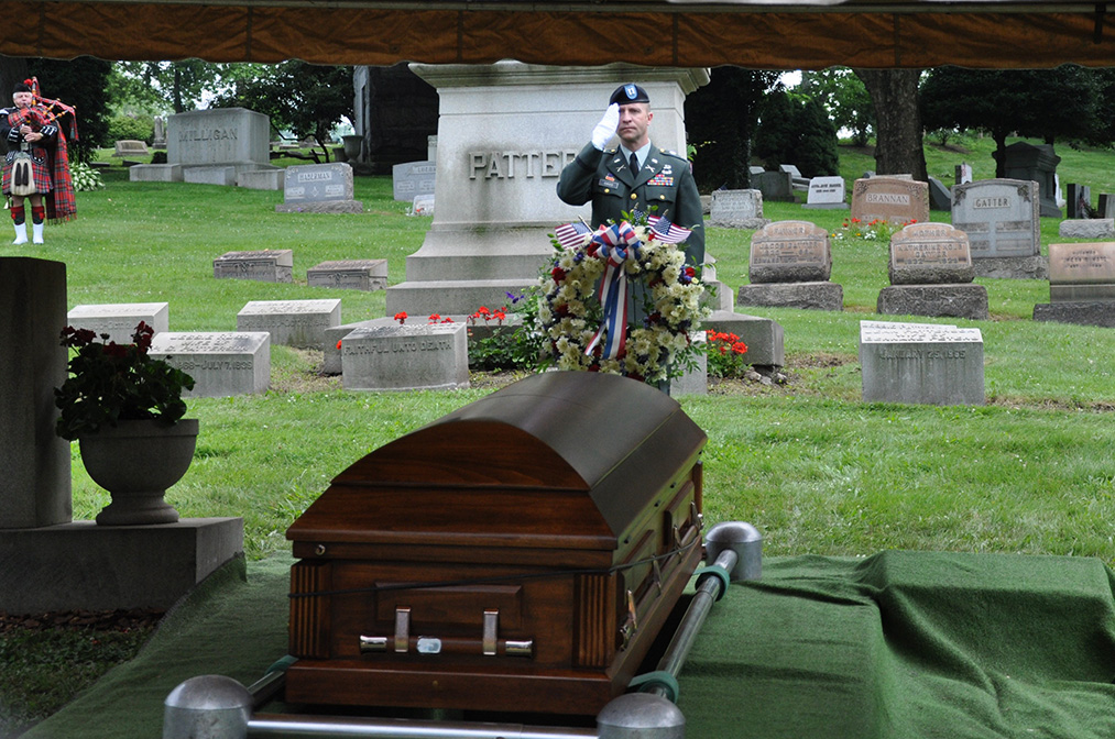 As Carl was laid to rest with his family in McKeesport, Pa., Capt. Eric Gass, Carl’s fellow soldier, gives him the final salute. Carl is home at last—90 years after his death. Courtesy of Noretta Willig.