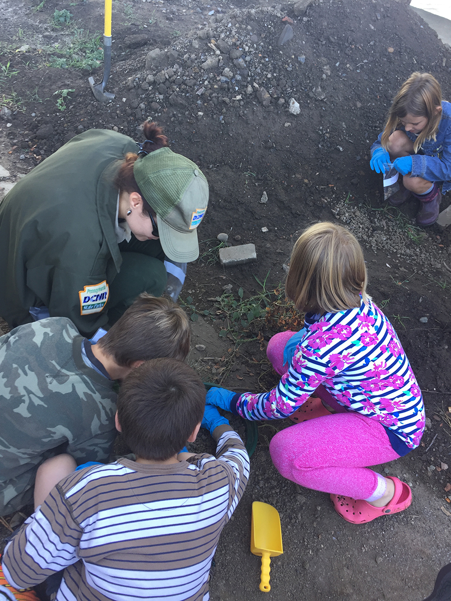 Students sift through dirt unearthed at Point State Park with state employees to identify the history of the Point through simple archeology. | Fort Pitt Museum