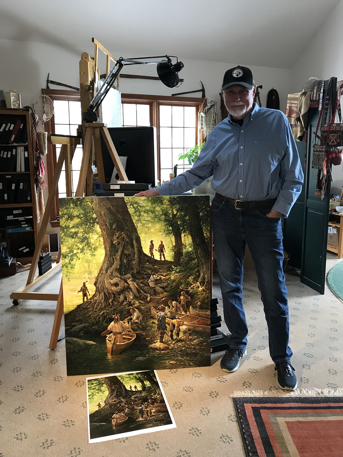 Robert Griffing with new painting, "Respect for the Ancients." Photo by Kathleen Lugarich.