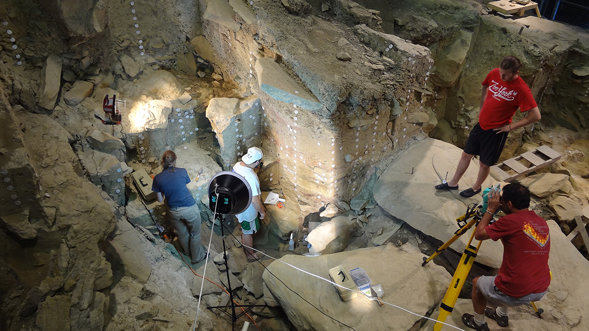 An excavation crew at work in the Rockshelter in 2013. Photo by David Scofield.
