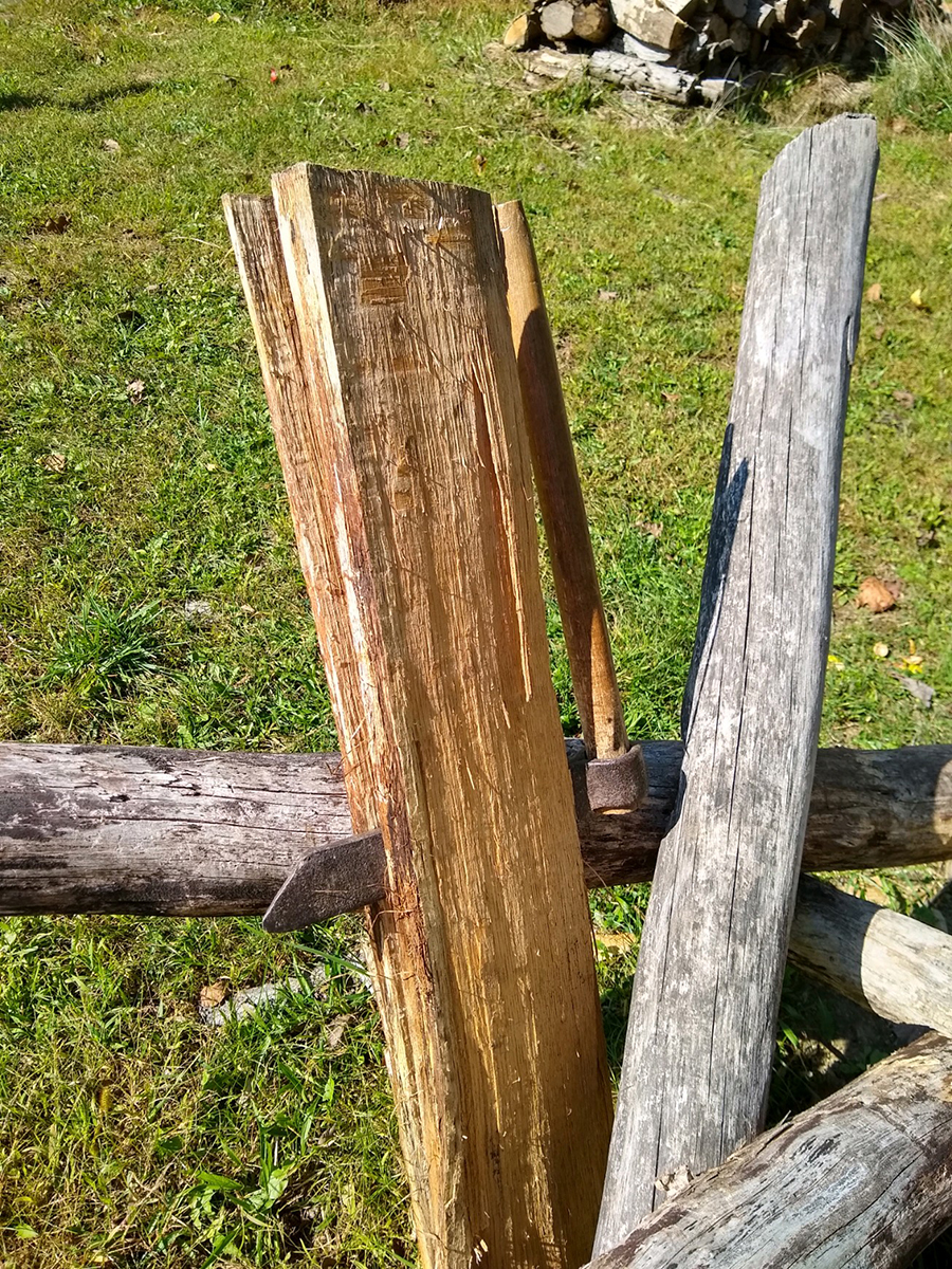 A froe, also spelled frow in historic accounts, is an iron tool with a wooden handle used to split (rive) wood with more control than an axe, wedge, or maul provides.