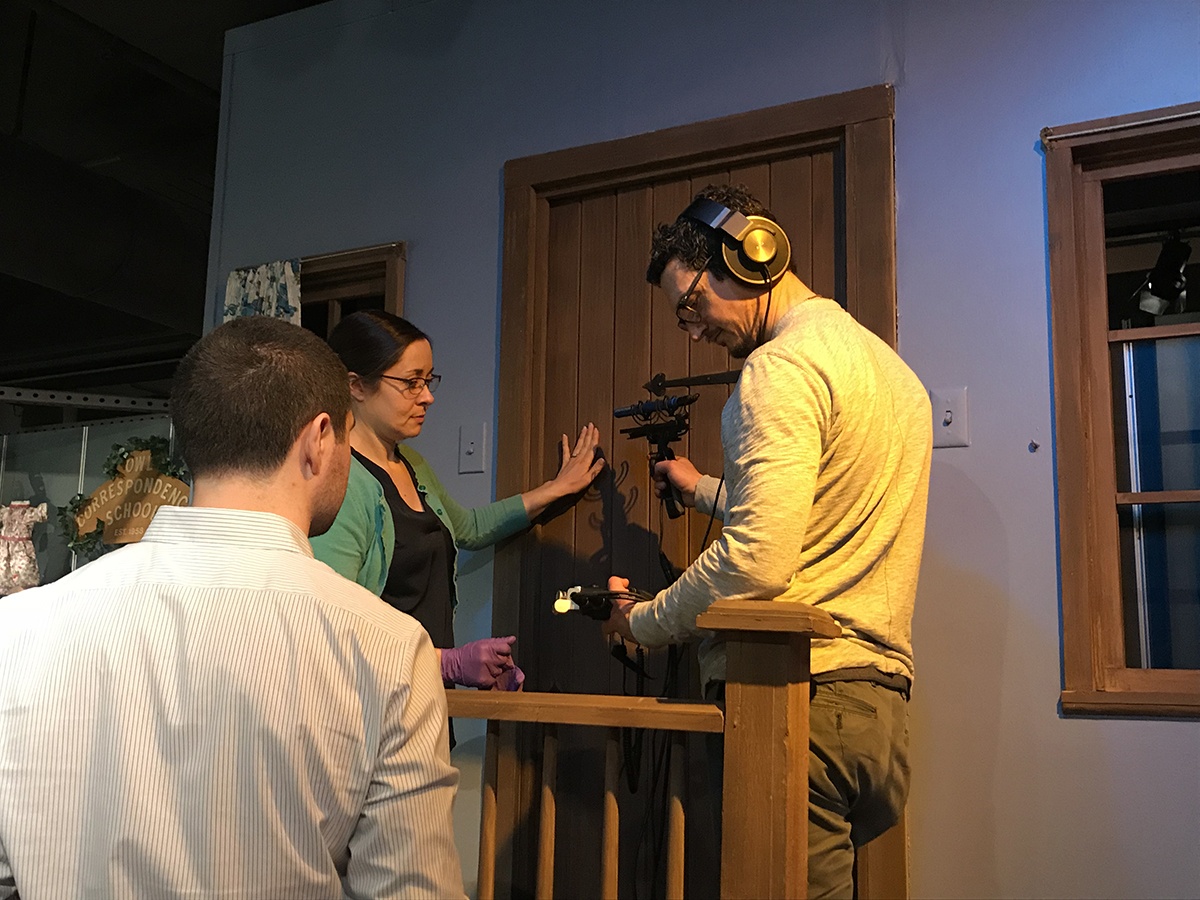 History Center registrar Nicole Lauletta assists an “A Beautiful Day in the Neighborhood” crew member recording the sound of a door opening and closing on The Great Oak Tree, residence of Henrietta Pussycat and X the Owl.