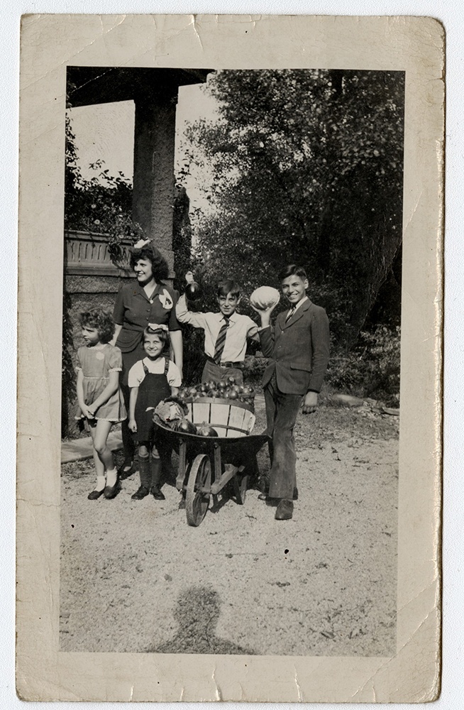 The Caliguiri Family poses with produce from their victory garden, 1940s. The Caliguiri Family poses with produce from their victory garden, 1940s.