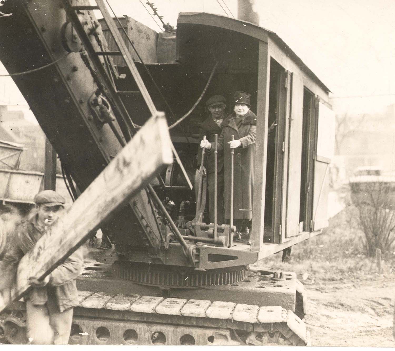 Annie Jacobs Davis operating a steam shovel during the groundbreaking ceremony for Montefiore Hospital on Fifth Avenue, 1927.