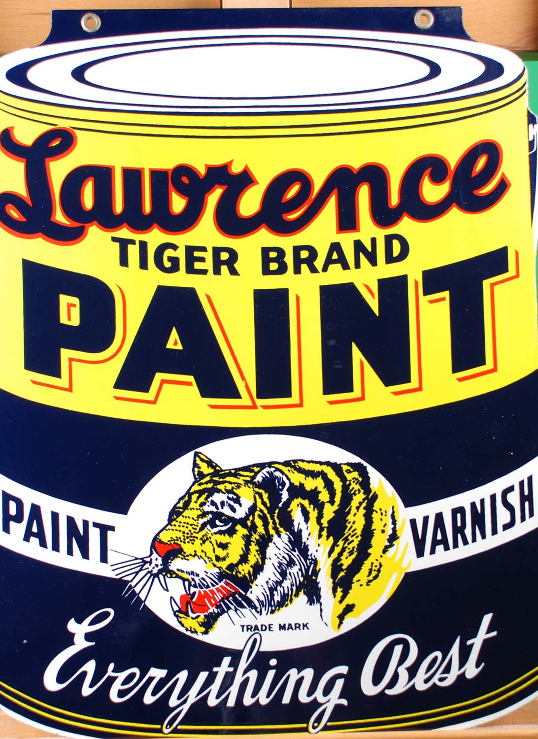 Double-sided enamel sign from the Levine Brothers hardware store that advertises Lawrence Tiger Brand paint. Gift of Levine Brothers, 2012.80.2. Photo by Liz Simpson.