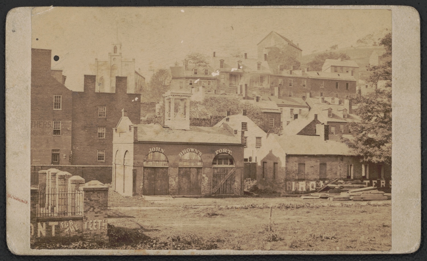 Photograph showing the fire engine house used by John Brown during his raid on Harper’s Ferry, c. 1885. The words “John Brown’s Fort” were painted on the building to attract tourists. Courtesy of the Library of Congress, Prints and Photographs Division.