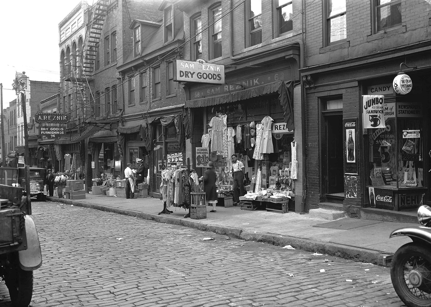 Sam Reznik and his younger brother Abe Reznik immigrated to Pittsburgh around 1904 and both opened dry goods stores of Logan Street. Pittsburgh City Photographer Collection, Archives & Special Collections, University of Pittsburgh.