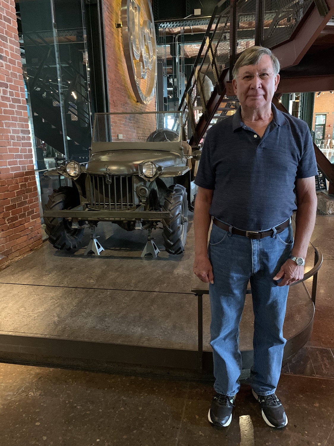 Ralph’s son, Dave Turner, with the world’s oldest surviving jeep (on long-term loan from the Smithsonian) in the History Center’s first floor Great Hall.