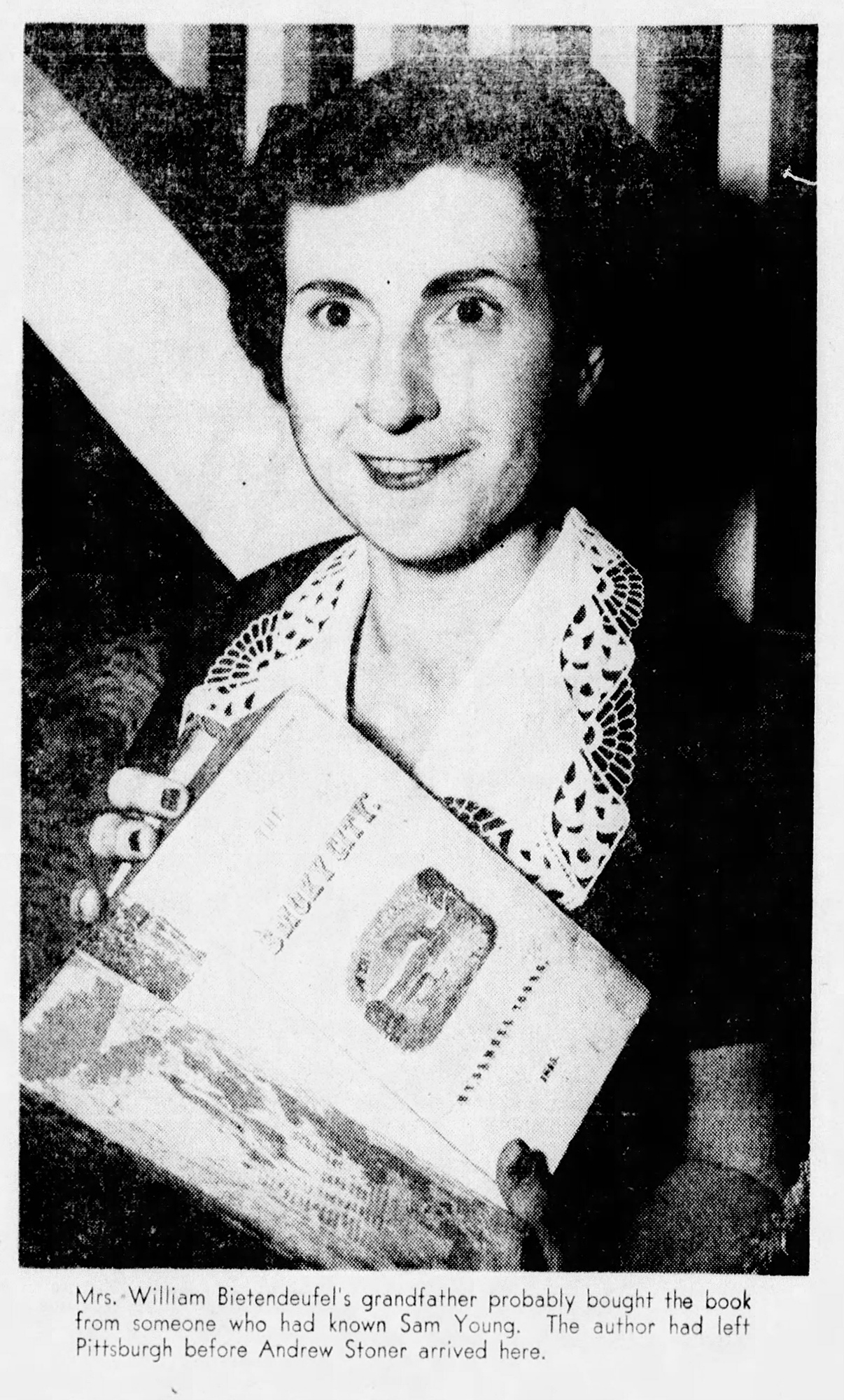 Press photo showing Mrs. William Bietendeufel’s discovery of a copy of The Smoky City in the attic of her Mt. Washington home, 1954. Pittsburgh Press, September 19, 1954.