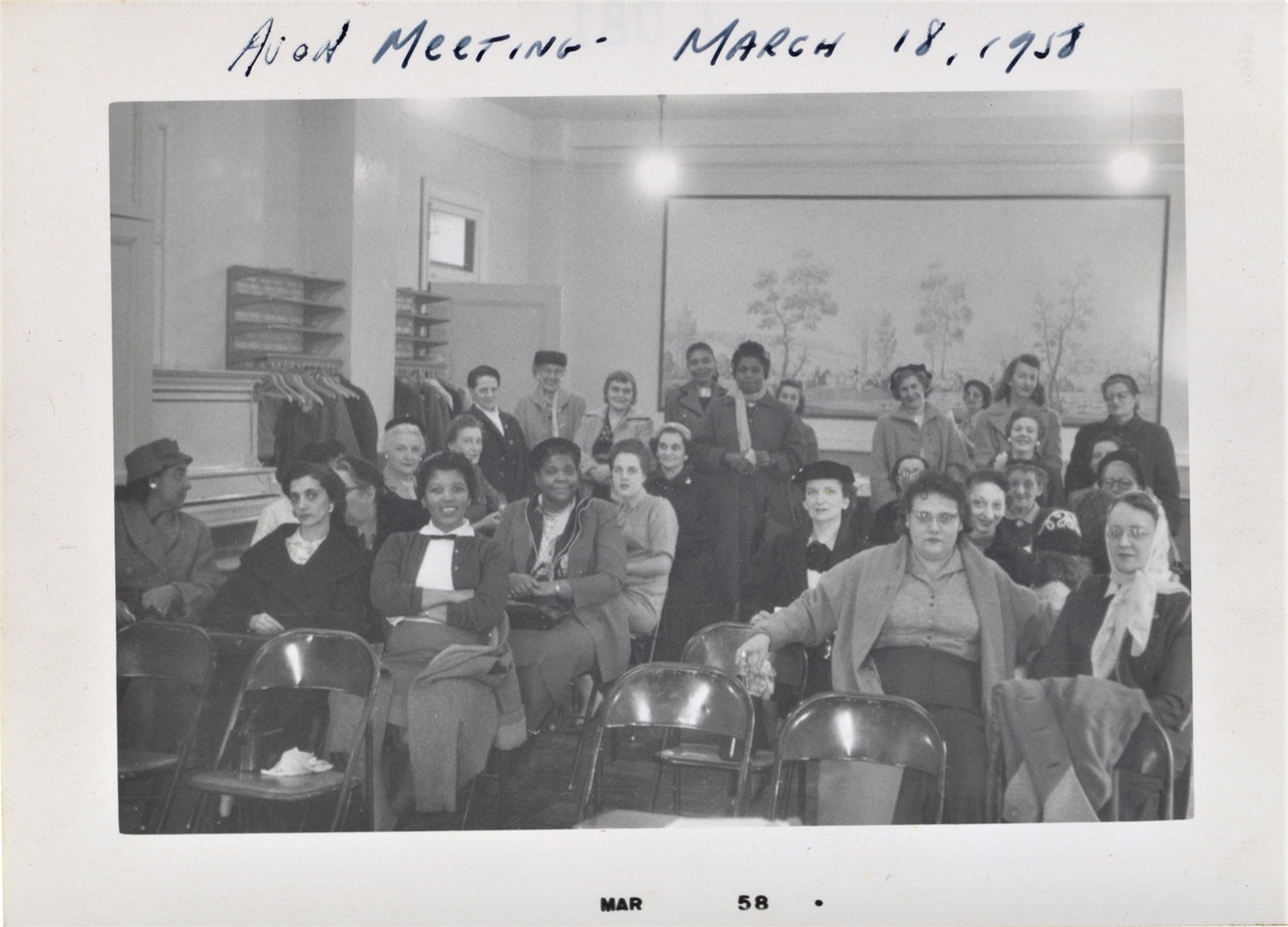 Photograph of an Avon district business meeting, March 18, 1958.