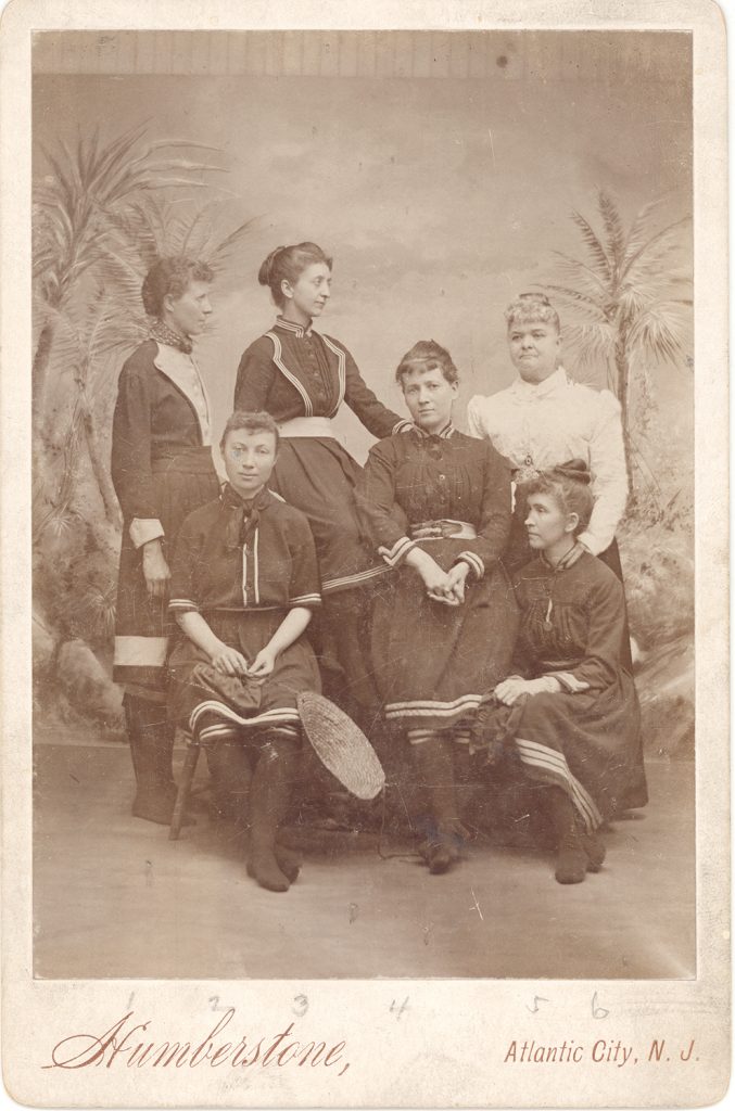 Group photograph including Elizabeth A. Wade, aka “Bessie Bramble,” Atlantic City, c. 1890. Wade (seen at far right in the light blouse) was probably serving as a chaperon for the group of younger women, all wearing bathing dresses of the period. They may have been local teachers. Elizabeth Wade Photographs, MSQ #183, Detre Library & Archives at the Heinz History Center.