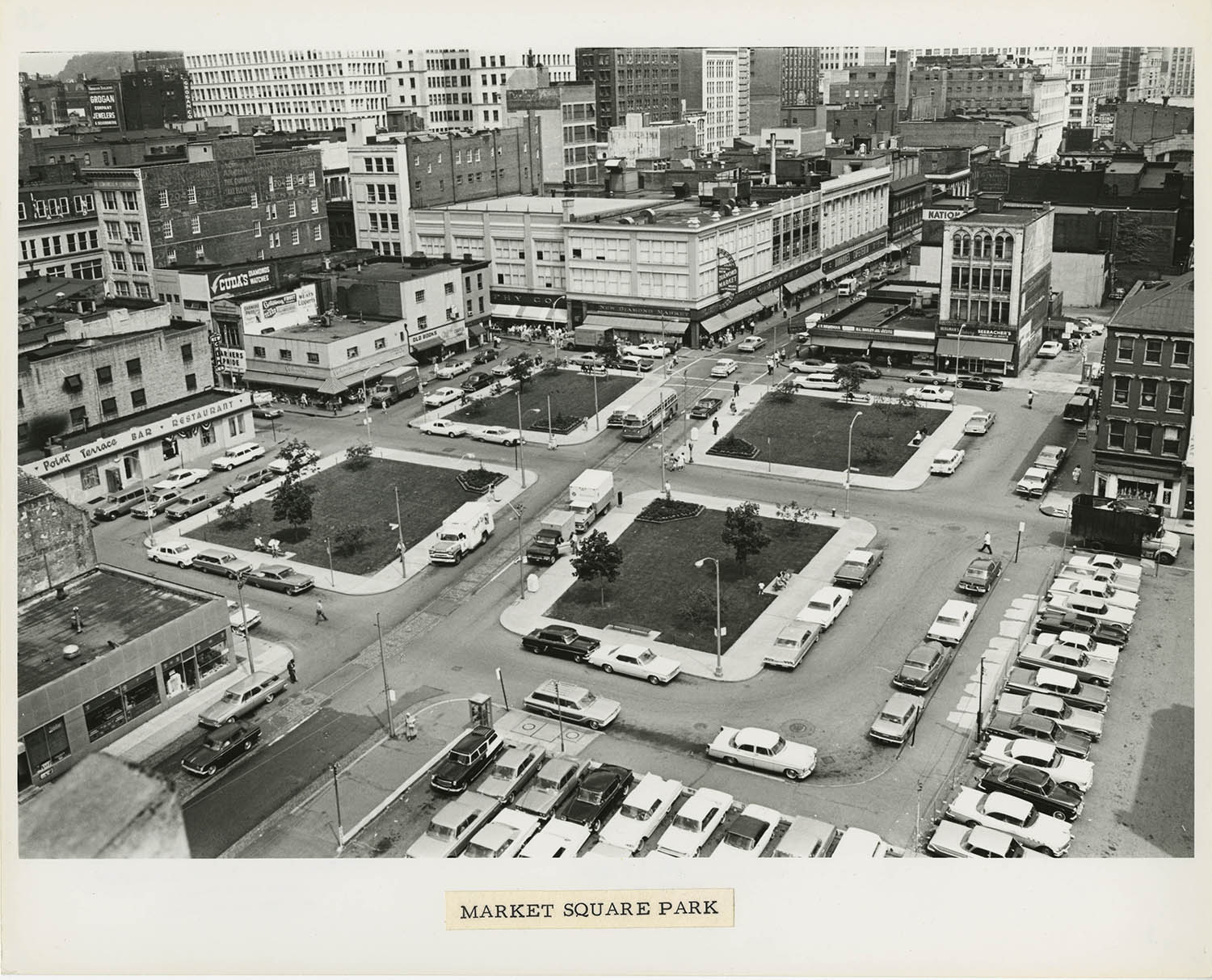 Market Square Park, July 1964. The footprint of the old Diamond Market can still clearly be seen in the park’s layout of four separate quadrants. From the Allegheny Conference on Community Development photographs, MSP 285, Detre Market Square Park, July 1964.