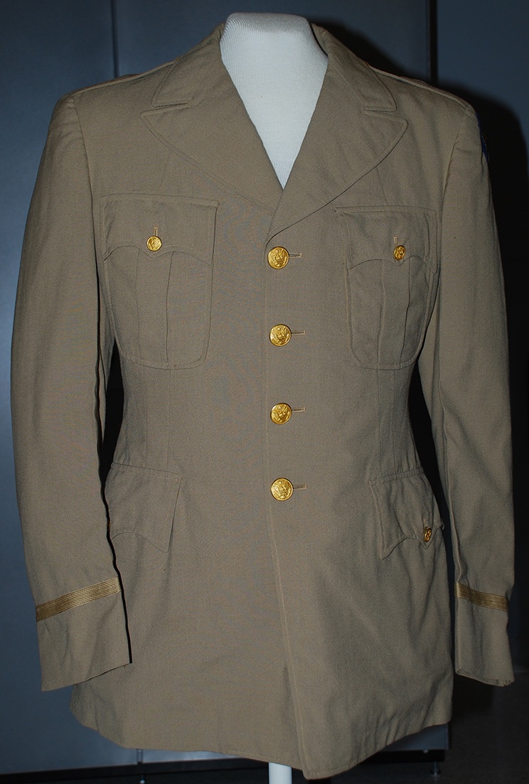 Tan cotton Tuskegee Airman's jacket, worn by William A. Johnston. Gift of Martha Johnston Wilkins.