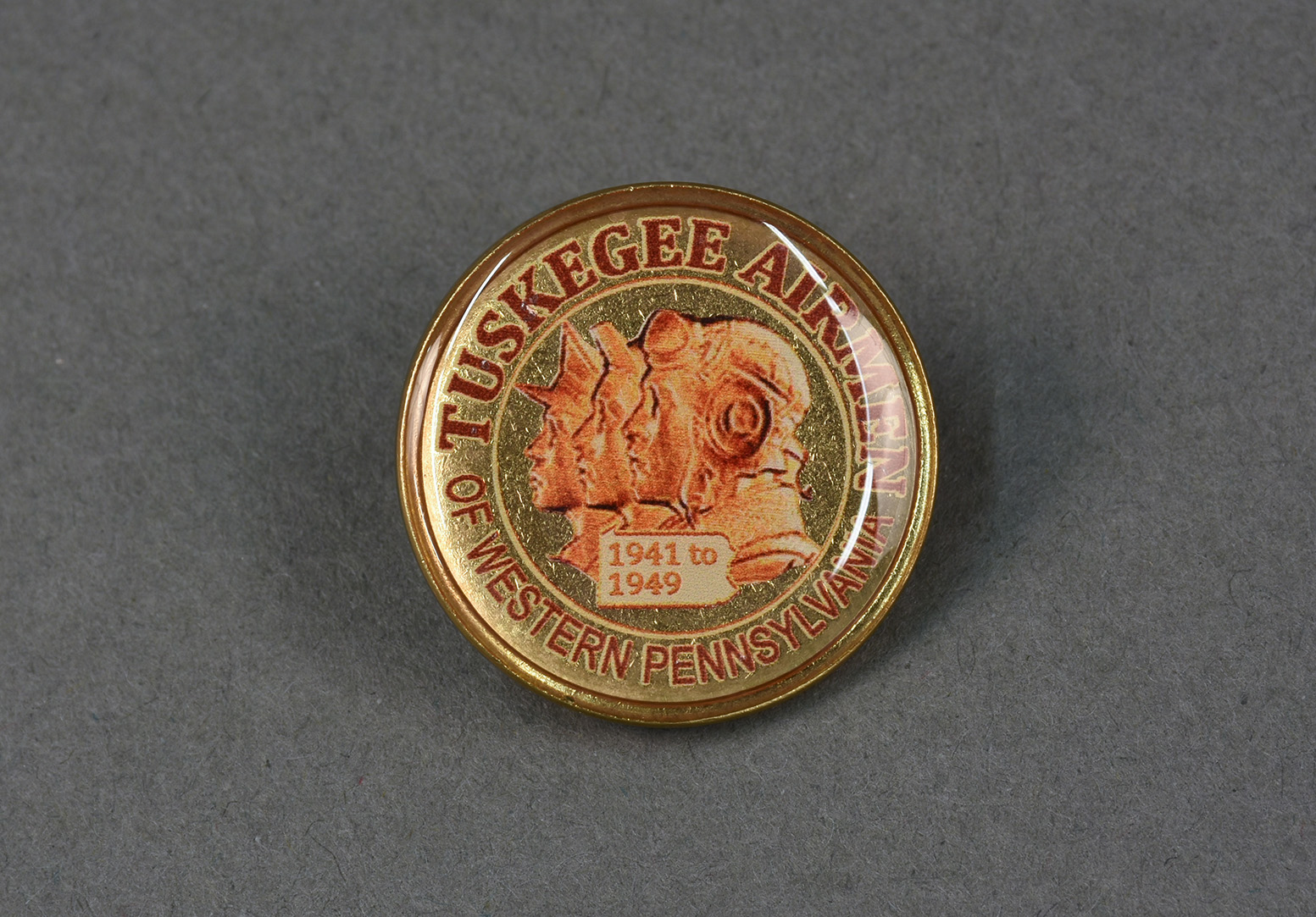 Tuskegee Airmen, Inc. (TAI) Western Pennsylvania lapel pin. Gift of Tuskegee Airmen Memorial.