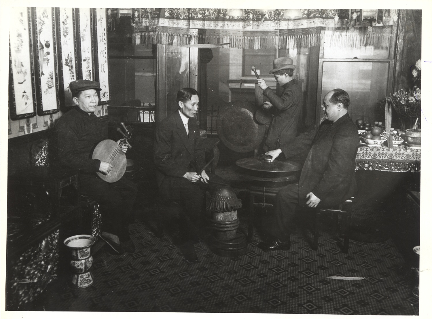 Men play traditional instruments in Chinatown, 1912. Gift of Elenore Seidenberg, MSP 566, Detre Library & Archives at the History Center.