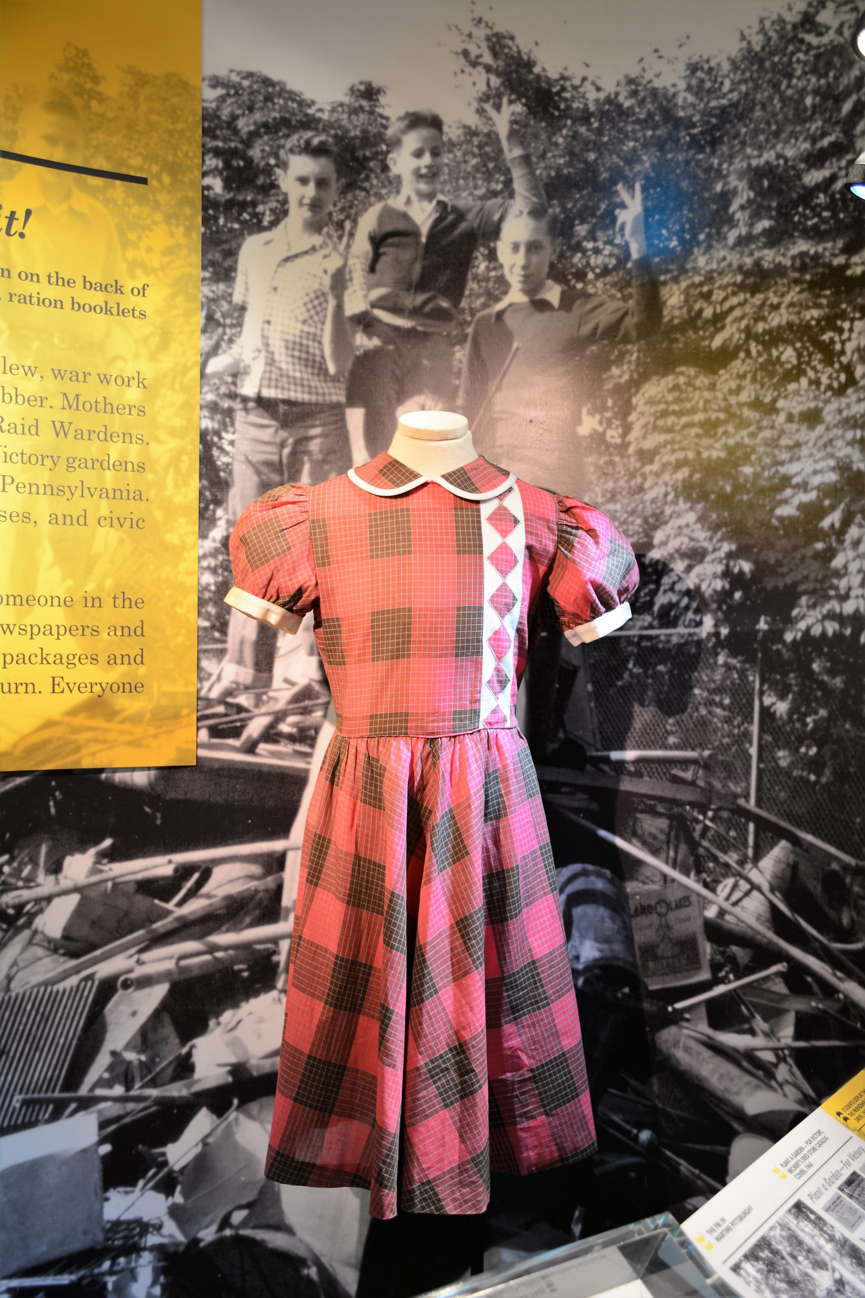 A Girl’s dress, c. 1940s, on display in We Can Do It! WWII. Photo from opening installation of exhibition at Heinz History Center, 2017. Currently on display in Barensfeld Gallery.