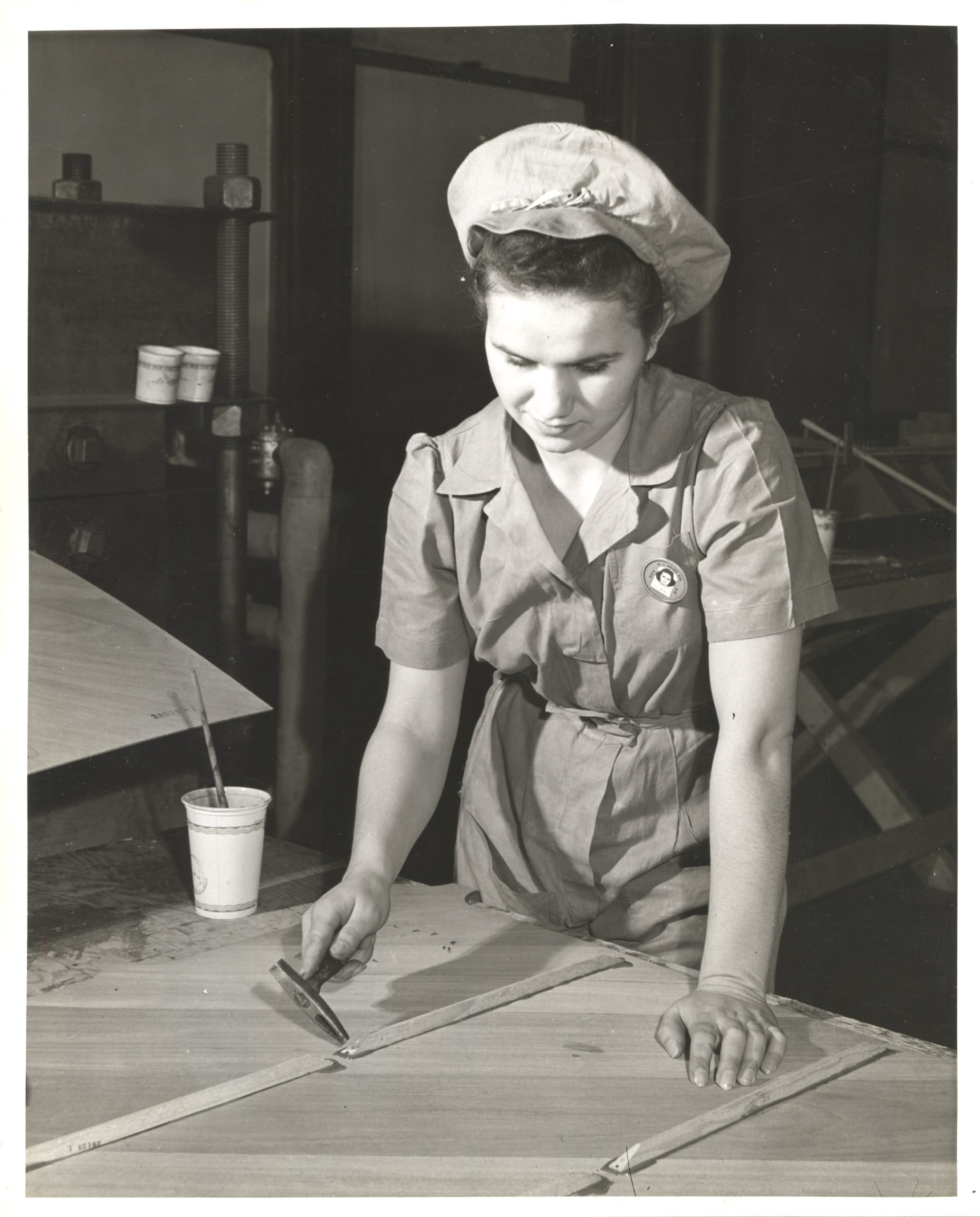 Olga Radosevich of Brentwood works on constructing part of a glider wing at the H. J Heinz Company, 1942.
